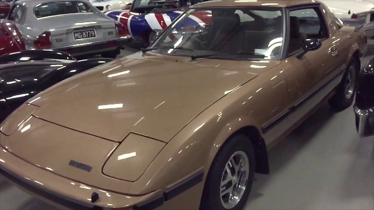 Mazda RX7 1983. All in Gold.