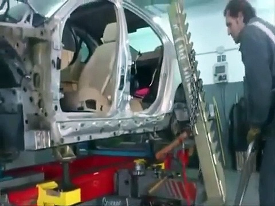 BMW E60 side damage collision repair on a Celette frame machine