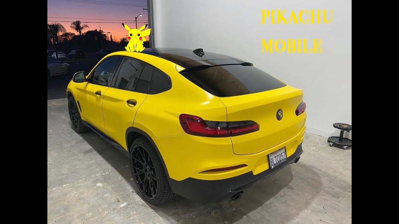 Bmw X4 comes in for a Satin Yellow wrap make over.