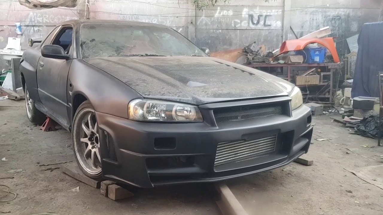 Oro bajo Chatarra – El Nissan skyline R34 tipo Gtr y El Porsche 911, dos leyendas!!!