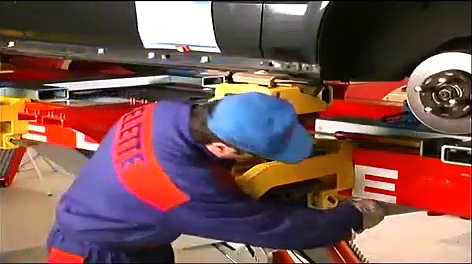 Honda Civic body repair on a Celette car frame machine, setup with universal jig, measuring system
