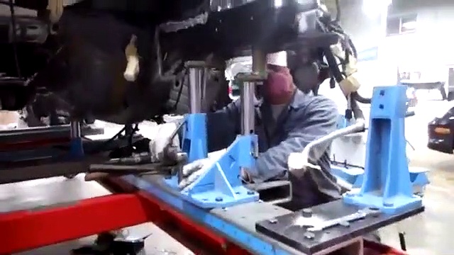 Audi repair on a Celette car bench frame machine, and universal jig @ panAM bodyshop